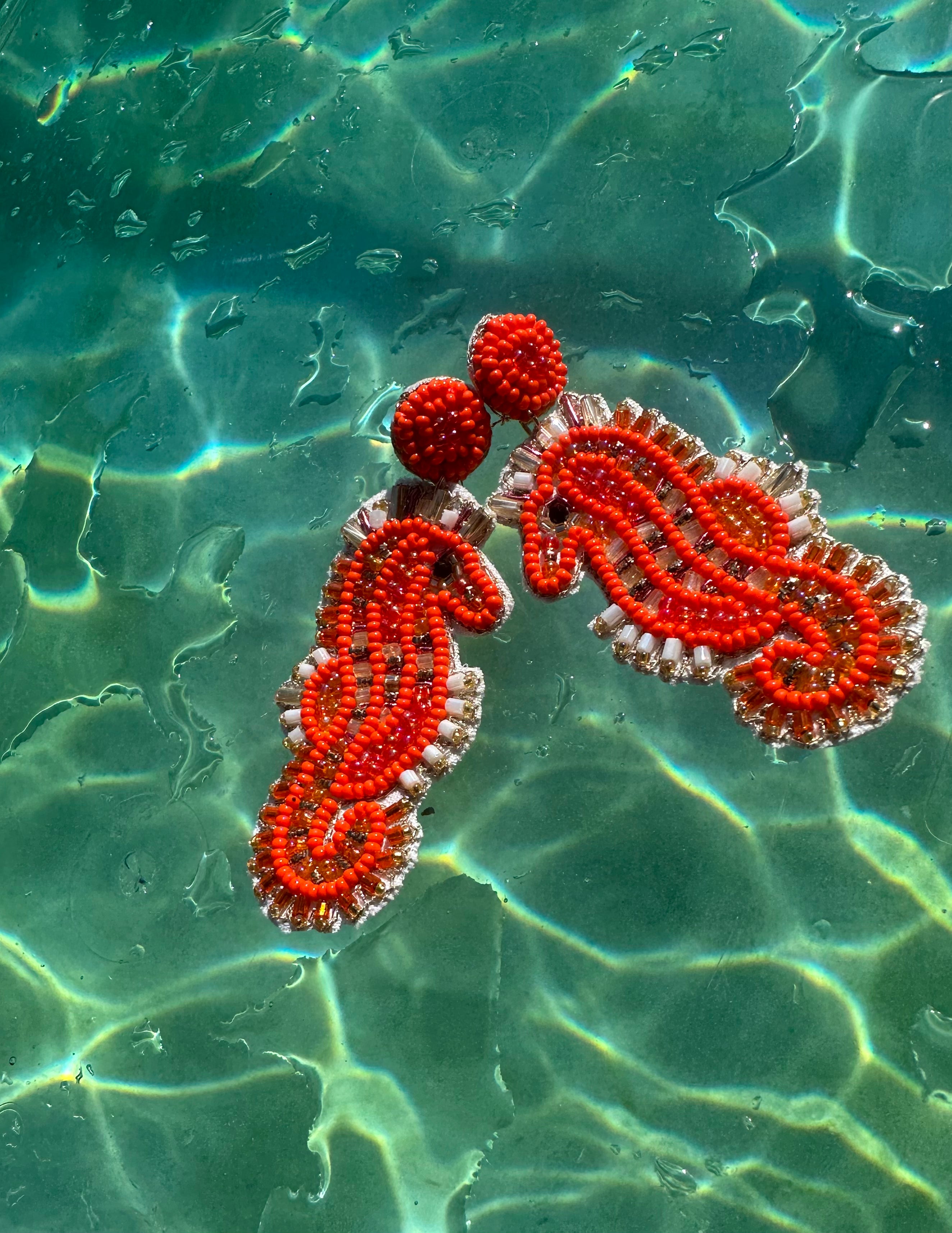 Orange seahorse earring