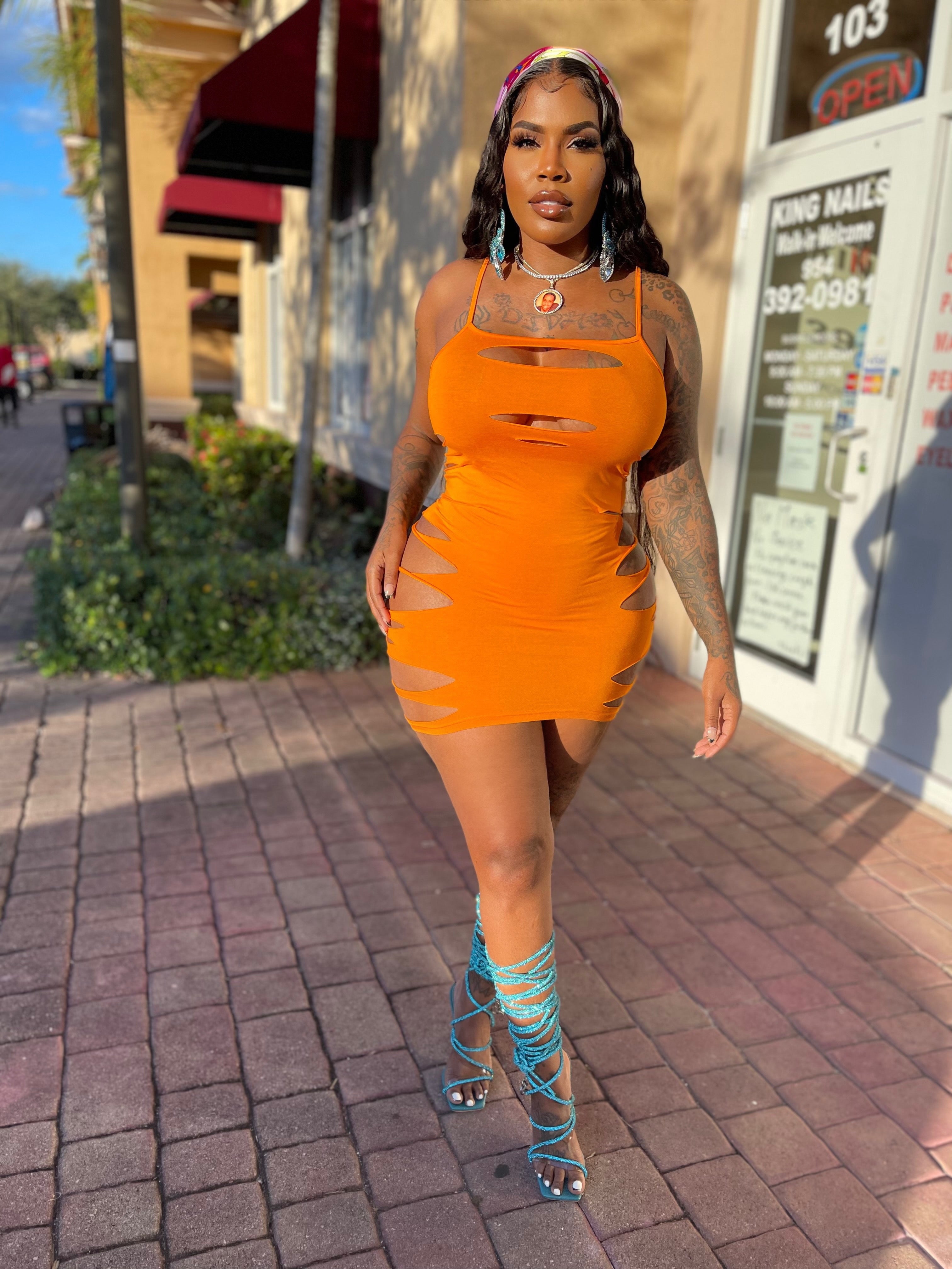 Orange cut up dress
